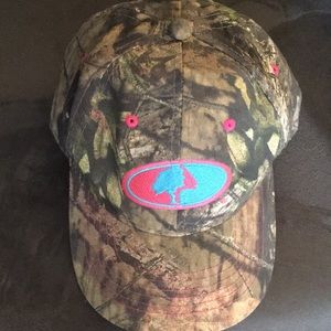 Camouflage cap with pink detailing. Good condition